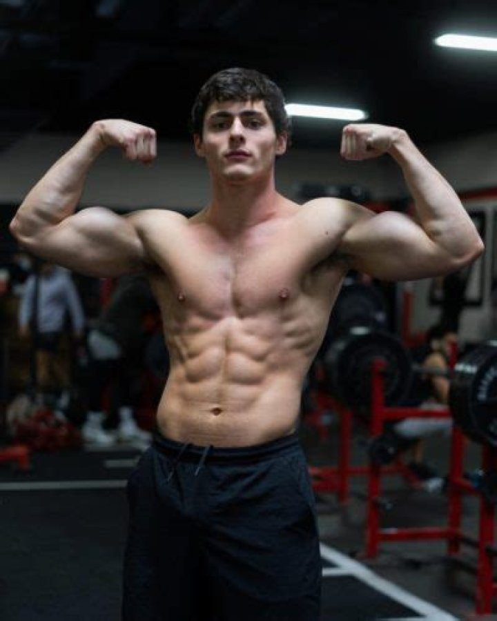 Gianluca flexing his shredded body