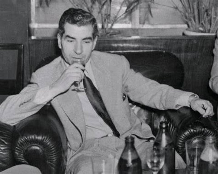 Lucky Luciano drinking wine.